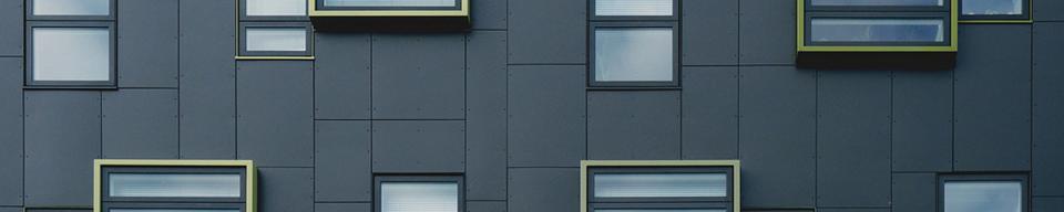 Black and yellow gold apartment block cladding Black and yellow gold apartment block cladding