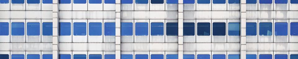 Grey office with blue windows