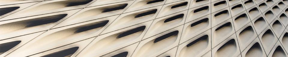 Cream slanted cladding against a blue sky
